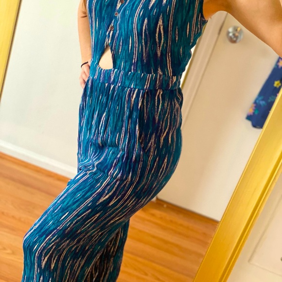 Blue jumpsuit with pockets and adjustable shoulder straps - Picture 3 of 5